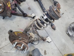 2007-2014 Chevrolet Tahoe Front Steering Knuckle with Aluminum Lower Control Arm - Left (Driver) (Used OEM)