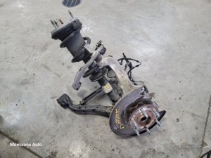 2019-2025 Chevrolet Silverado 1500 Front Spindle Steering Knuckle Assembly - Left (Driver) (Used OEM)