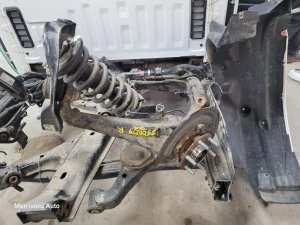 2022-2025 Nissan Frontier Steering Knuckle - Right (Passenger) (Used OEM)