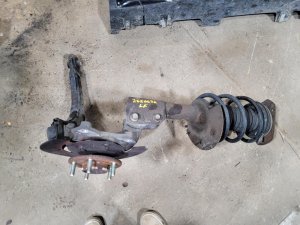 2009-2016 Chevrolet Impala Front Steering Knuckle - Left (Driver) (Used OEM)