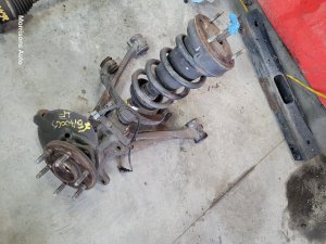 2007-2014 Chevrolet Tahoe Front Steering Knuckle and Cast Iron Lower Control Arm Assembly - Left (Driver) (Used OEM)