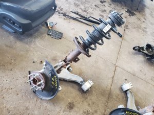 2010-2016 Cadillac SRX Front Steering Knuckle - Left (Driver) (Used OEM)