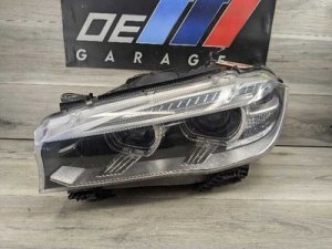  BMW X5 m White AHL Xenon Headlight Assembly, Left (Used OEM)