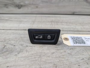 2009-2015 BMW 750i Black Trunk Lid Center Lock Switch - Rear (Used OEM)