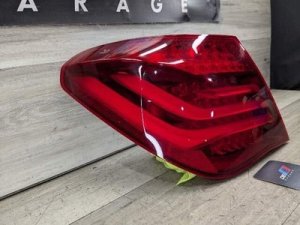 2013-2015 BMW Alpina B7 Black Rear Left Outer Tail Light Assembly (Used OEM)