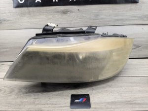 2009-2012 BMW 328i Black Left Halogen Headlight Assembly (Used OEM)