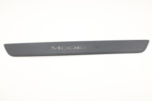 2020-2024 Tesla Y Door Sill Plate Trim - Front (Used OEM)