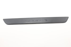 2020-2025 Tesla Y Rear Door Sill Plate Trim - Front (Used OEM)