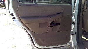 2002-2005 Ford Explorer Tan Door Interior Trim Panel with Power Windows and Locks - Rear, Left (Driver) (Used OEM)