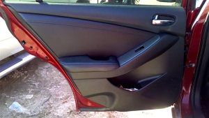 2007-2012 Nissan Altima Black Door Interior Trim Panel - Rear, Left (Driver) (Used OEM)