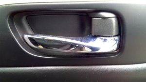 2015-2019 Nissan Murano Chrome Interior Door Handle - Left (Driver) (Used OEM)