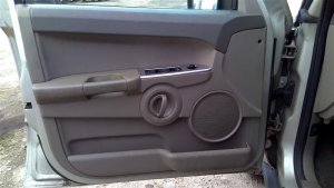 2006-2010 Jeep Commander Beige Door Interior Trim Panel with Power Windows and Locks - Front, Left (Driver) (Used OEM)