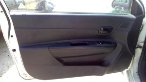 2006-2011 Hyundai Accent Black Door Interior Trim Panel with Manual Windows and Locks - Front, Left (Driver) (Used OEM)