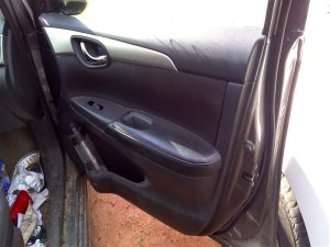 2016-2019 Nissan Sentra Black Door Interior Trim Panel - Front, Right (Passenger) (Used OEM)