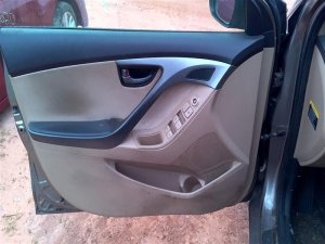 2011-2016 Hyundai Elantra Tan Door Interior Trim Panel with Power Windows and Locks - Front, Left (Driver) (Used OEM)