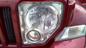 2008-2012 Jeep Liberty Chrome Chrome Bezel Headlight Assembly - Left (Driver) (Used OEM)