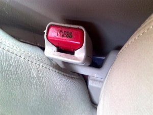 2014-2017 Nissan Rogue Tan Seat Belt Buckle - Front, Left (Driver) (Used OEM)