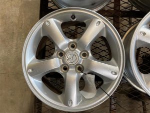 2005-2009 Mazda Tribute 16x7 5-Spoke Oval Dimple Alloy Wheel (Used OEM)