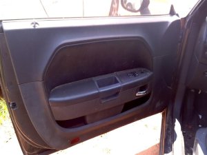 2008-2014 Dodge Challenger Black Door Interior Trim Panel with Power Windows and Locks - Front, Left (Driver) (Used OEM)