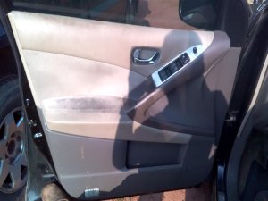 2009-2014 Nissan Murano Tan Door Interior Trim Panel with Power Windows and Locks - Front, Left (Driver) (Used OEM)
