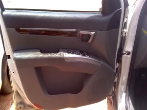 2010-2012 Hyundai Santa Fe Gray Door Interior Trim Panel with Power Windows and Power Locks - Front, Left (Driver) (Used OEM)