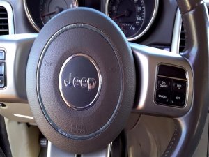 2011-2013 Jeep Grand Cherokee Tan Steering Wheel Air Bag - Left (Driver) (Used OEM)