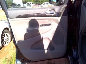 2011-2021 Jeep Grand Cherokee Gray Door Interior Trim Panel with Power Windows and Locks - Front, Left (Driver) (Used OEM)