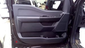 2021-2025 Ford F-150 Black Door Interior Trim Panel with Power Windows and Locks - Front, Left (Driver) (Used OEM)