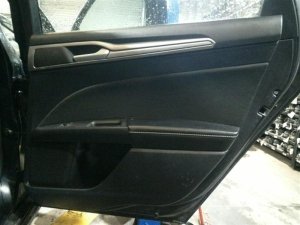 2017-2020 Ford Fusion Black Door Interior Trim Panel with Power Windows and Locks - Rear, Left (Driver) (Used OEM)