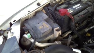 1998-2006 Ford F-150 Washer Fluid Reservoir Assembly with Pump (Used OEM)