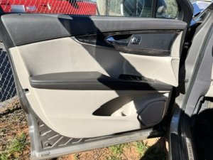 2016-2018 Lincoln MKX Tan Door Interior Trim Panel with Power Windows and Locks - Front, Left (Driver) (Used OEM)