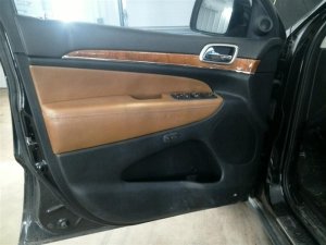 2011-2013 Jeep Grand Cherokee Black Door Interior Trim Panel with Power Windows and Locks - Front, Left (Driver) (Used OEM)