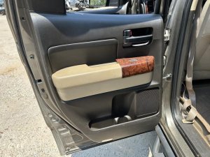 2008-2013 Toyota Sequoia Tan Door Interior Trim Panel - Rear, Left (Driver) (Used OEM)