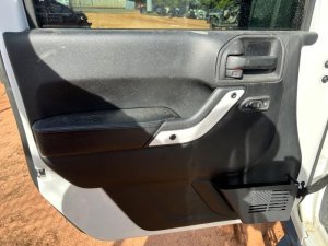 2015-2018 Jeep Wrangler Black Door Interior Trim Panel - Front, Left (Driver) (Used OEM)