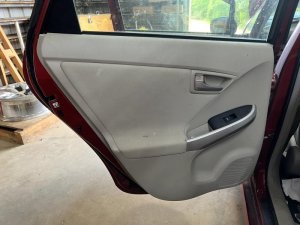 2010-2015 Toyota Prius Tan Door Interior Trim Panel - Rear, Left (Driver) (Used OEM)