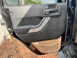 2011-2018 Jeep Wrangler Black Door Interior Trim Panel - Rear, Left (Driver) (Used OEM)
