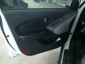 2010-2015 Hyundai Tucson Brown Door Interior Trim Panel with Power Windows and Locks - Front, Left (Driver) (Used OEM)