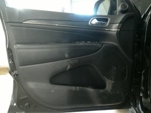2020-2021 Jeep Grand Cherokee Black Door Interior Trim Panel with Power Windows and Locks - Front, Left (Driver) (Used OEM)