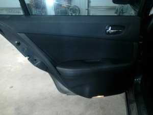 2009-2014 Nissan Maxima Black Door Interior Trim Panel with Power Windows and Locks - Rear, Left (Driver) (Used OEM)
