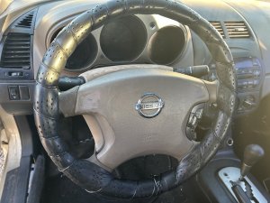 2002-2004 Nissan Altima Tan Steering Wheel Air Bag - Left (Driver) (Used OEM)