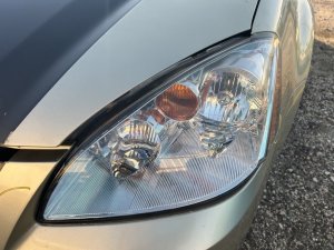 2002-2004 Nissan Altima Headlight Assembly - Left (Driver) (Used OEM)