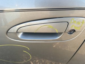 2002-2006 Nissan Altima White Front Exterior Door Handle - Left (Driver) (Used OEM)