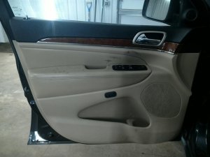 2011-2013 Jeep Grand Cherokee Tan Door Interior Trim Panel with Power Windows and Locks - Front, Left (Driver) (Used OEM)