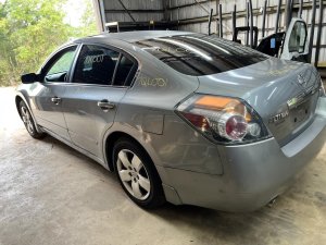 2007-2012 Nissan Altima Gray Fuel Filler Door (Used OEM)