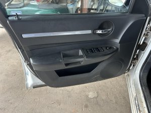 2008-2010 Dodge Charger Black Door Interior Trim Panel - Front, Left (Driver) (Used OEM)