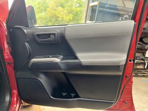 2016-2023 Toyota Tacoma Black Door Interior Trim Panel - Front, Right (Passenger) (Used OEM)