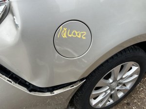 2010-2016 Buick LaCrosse Gold Fuel Filler Door (Used OEM)