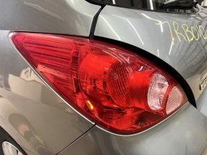 OEM Quarter Panel Mounted Hatchback Tail Light for 2007-2012 Nissan VERSA, Versa - Left (Driver) (OEM)
