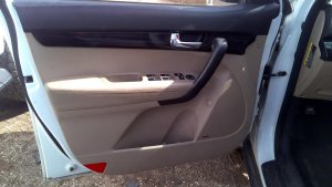 2011-2013 Kia Sorento Tan Door Interior Trim Panel with Power Windows and Locks - Front, Left (Driver) (Used OEM)