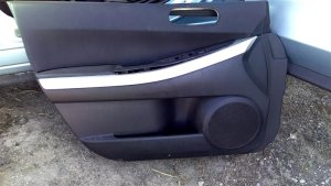 2007-2009 Mazda CX-7 Black Door Interior Trim Panel with Power Windows and Locks - Front, Left (Driver) (Used OEM)